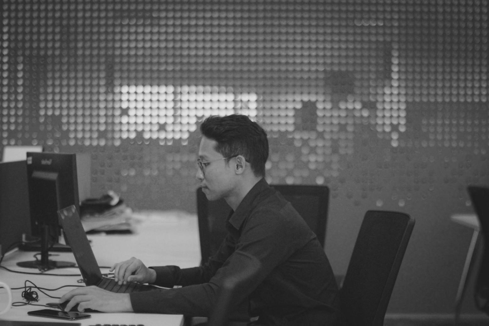 Blockchain network architecture planning session showing consortium member mapping and governance structure design