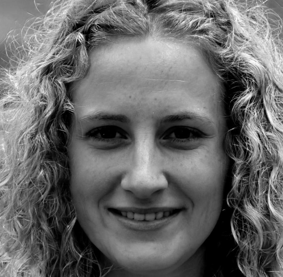 Integration specialist Elena Kowalski managing blockchain system deployment and member onboarding